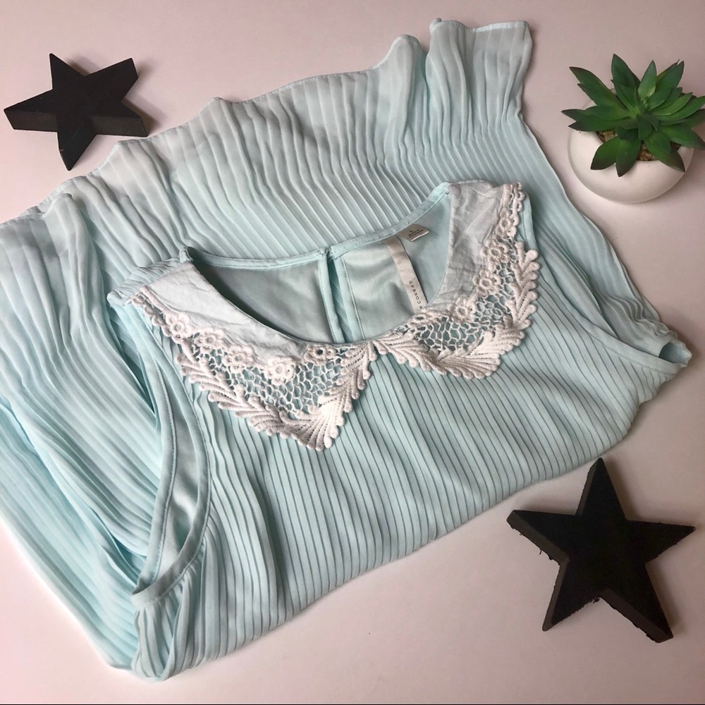 Flowy Peter Par Collared Top!